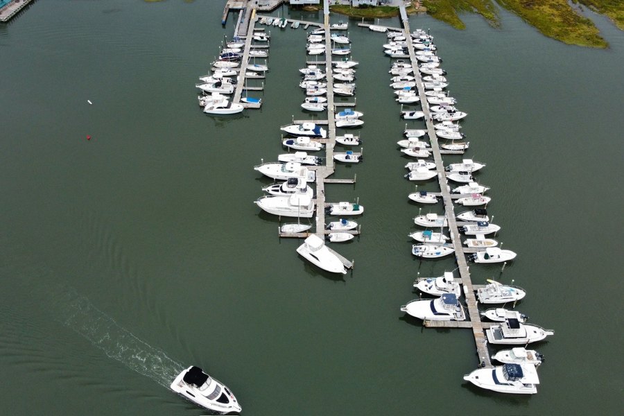 Aerial view of boats moored in the marina's seasonal slips